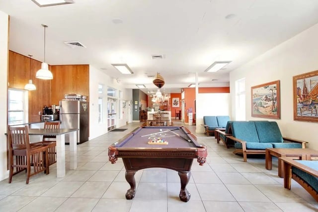 Pool table and seating area common room at West Run Morgantown in Morgantown Student Accommodation