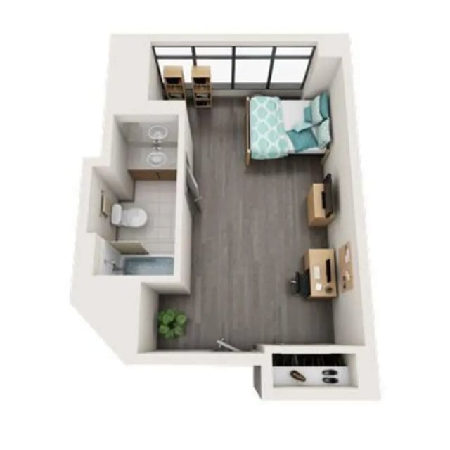 Bed desk and bathroom student studio apartment at University Center in Chicago Student Accommodation