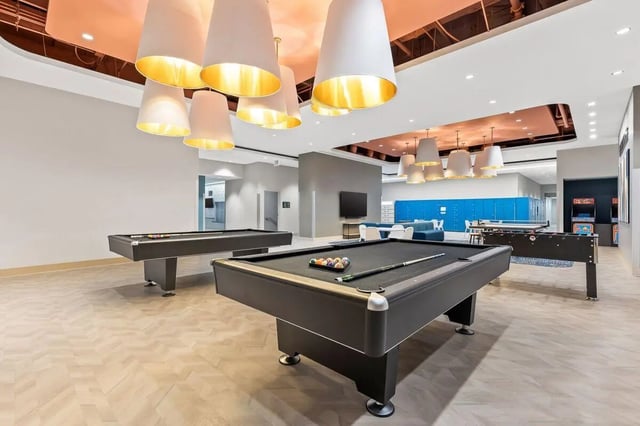 Pool tables foosball arcade machines recreation area at University Center in Chicago Student Accommodation