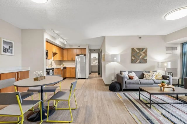 Dining table kitchen and living room area at University Center in Chicago Student Accommodation
