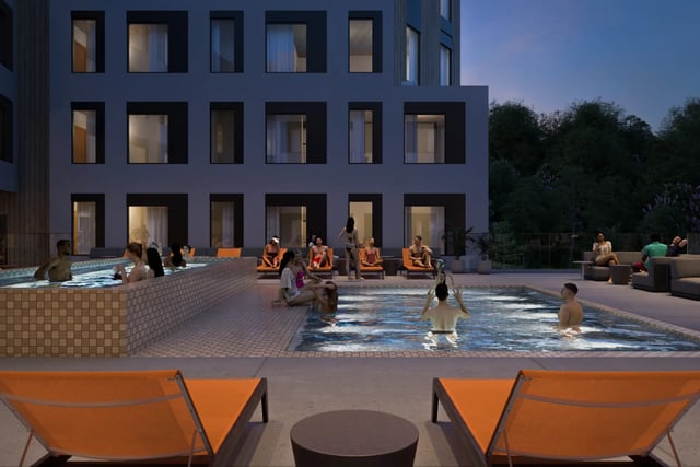 People swimming and lounging by pool exterior at Villas Knoxville in Knoxville Student Accommodation