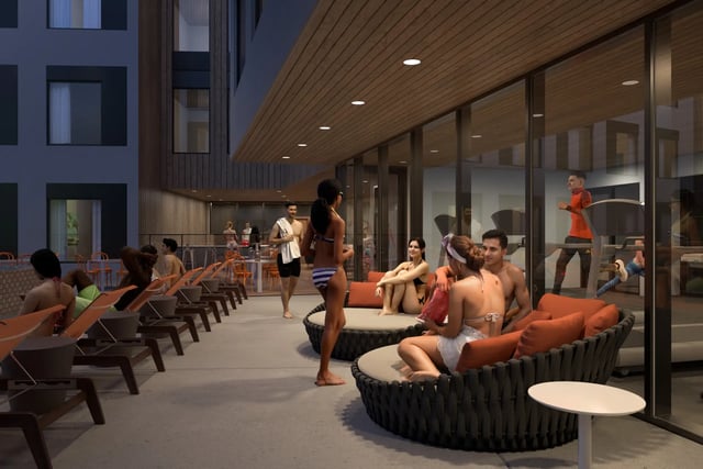 People relaxing on loungers and seating area exterior at Villas Knoxville in Knoxville Student Accommodation