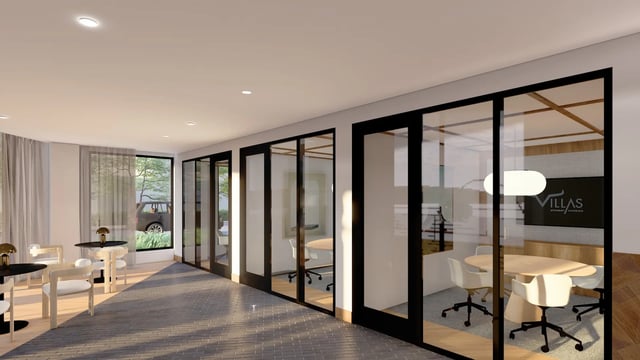 Tables chairs and glass rooms common area at Villas Knoxville in Knoxville Student Accommodation