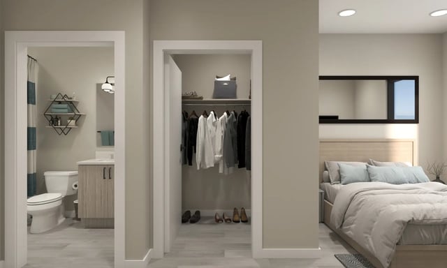 Bedroom closet and bathroom with toilet and vanity. Bathroom at Villas Knoxville in Knoxville Student Accommodation