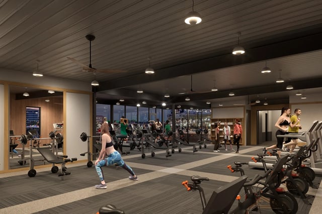 Treadmills weights bikes people exercising fitness gym at Villas Knoxville in Knoxville Student Accommodation