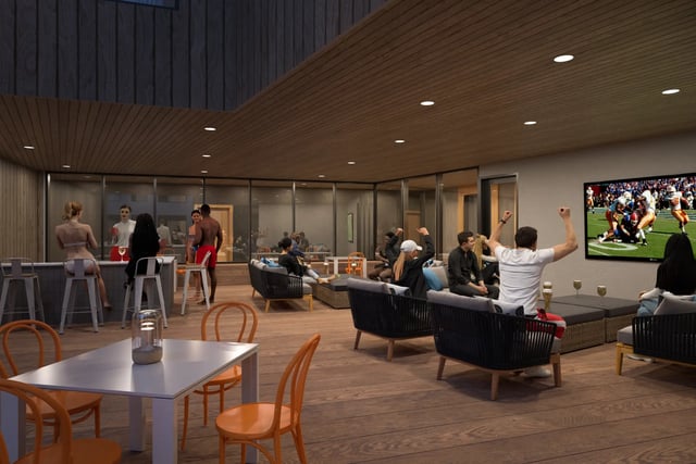 People watching football at bar and seating area living room at Villas Knoxville in Knoxville Student Accommodation