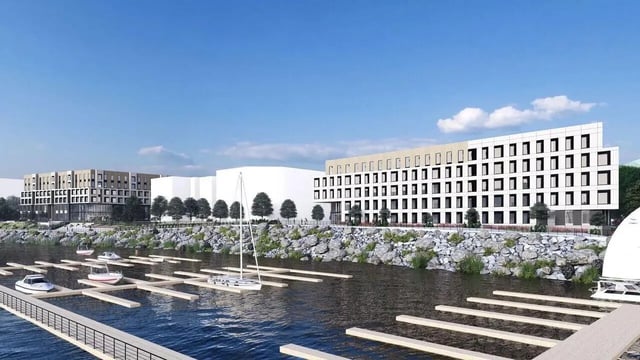 Modern building on waterfront with boats exterior at Villas Knoxville in Knoxville Student Accommodation