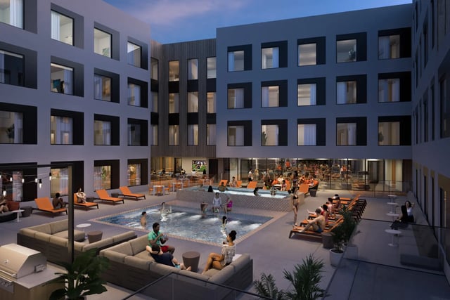 Courtyard pool with lounge chairs and seating exterior at Villas Knoxville in Knoxville Student Accommodation