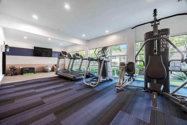 Treadmills elliptical weight machine gym fitness area at Villas On Guadalupe in Austin Student Accommodation