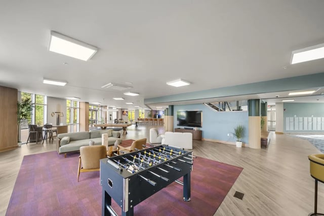 Foosball table couches pool table common area at The Hill at Rochester in Rochester Student Accommodation