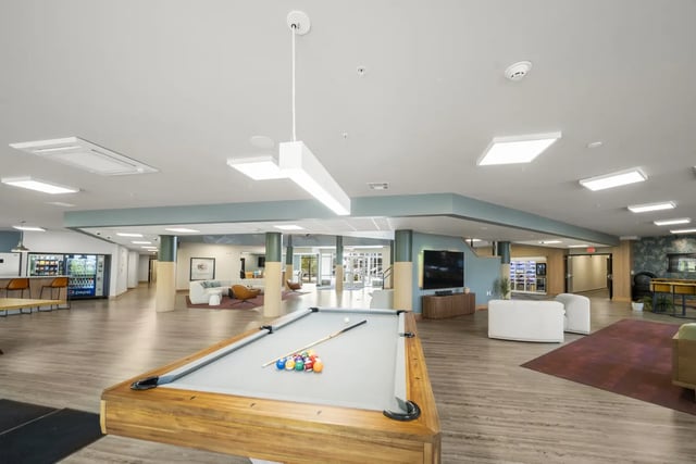Pool table and seating area common room at The Hill at Rochester in Rochester Student Accommodation