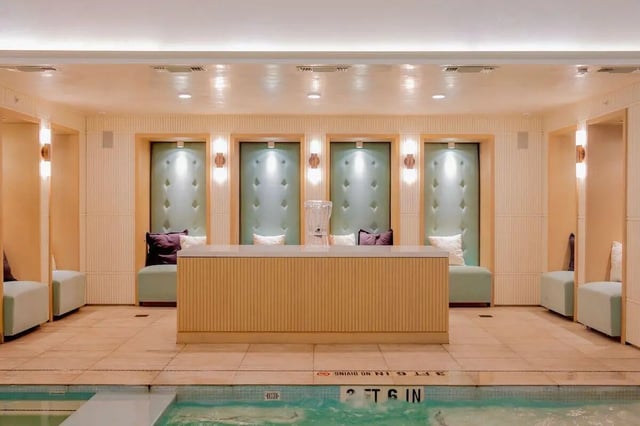 Cabanas with plush seating and a central counter lounge area at Villas on Rio in Austin Student Accommodation