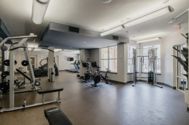 Weight machines treadmills and bikes gym at The Pavilion at North Grounds Apartments in Charlottesville Student Accommodation