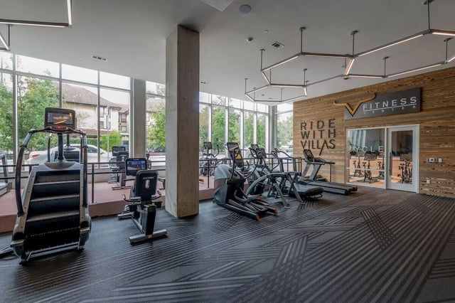 Fitness equipment including treadmills ellipticals stationary bikes gym at Villas on Rio in Austin Student Accommodation