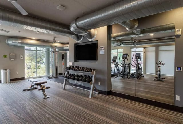 Dumbbell rack elliptical machines exercise bike gym. at 44 North in Minneapolis Student Accommodation