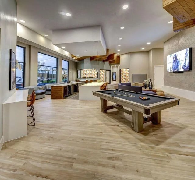 Billiard table sofas and bar seating common area at The Lyndon in San Marcos Student Accommodation