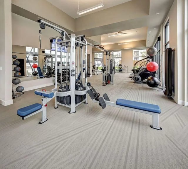 Weight machines rowing machine exercise balls gym at The Lyndon in San Marcos Student Accommodation