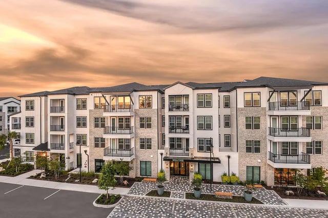 Modern apartments with balconies and landscaped entrance exterior at Aero on 24th in Gainesville Student Accommodation