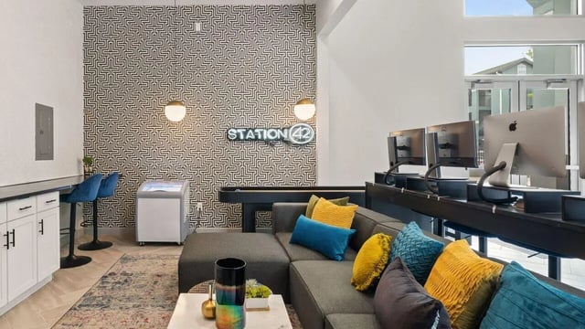 Computers sofa bar stools and ice machine lounge at Station 42 in Tampa Student Accommodation