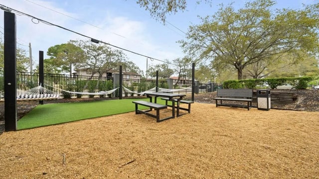 Hammocks picnic tables benches outdoor recreation area at Station 42 in Tampa Student Accommodation