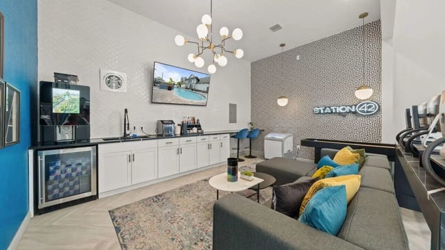 Modern lounge with coffee bar seating couch living room at Station 42 in Tampa Student Accommodation