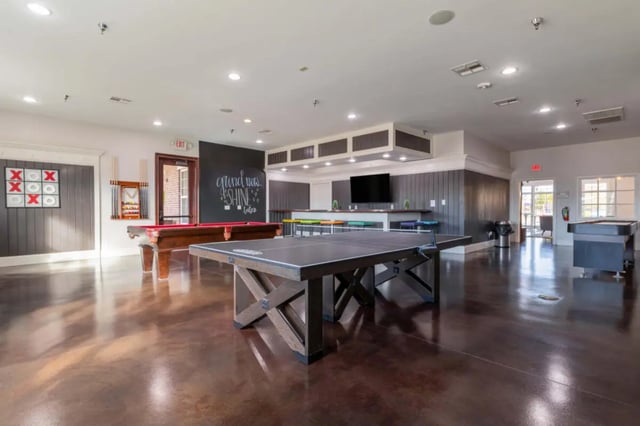Ping pong and pool tables lounge area at Alight 12th Ave in Norman Student Accommodation