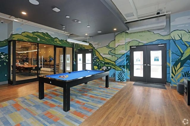 Pool table and study area with mural Image at The Finmore at 241 in Boone Student Accommodation