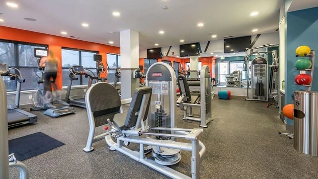 Treadmills machines weights colorful balls gym area at The Avenue Indianapolis in Indianapolis Student Accommodation