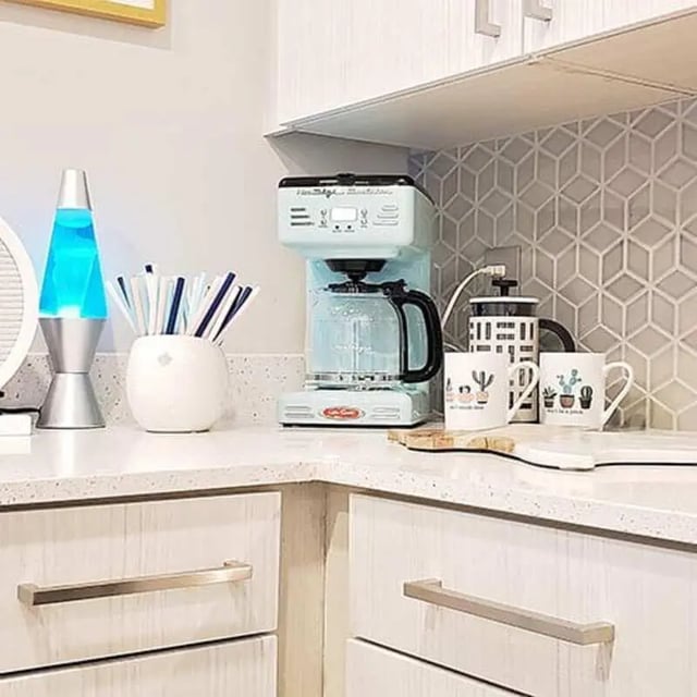 Blue lava lamp coffee maker cactus mugs kitchen at Lark Austin in Austin Student Accommodation