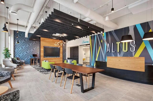 Modern lobby with desks seating and reception area communal area at Altus Towson Row in Towson Student Accommodation