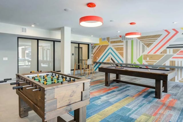 Foosball table pool table modern decor playing area at Altus Towson Row in Towson Student Accommodation