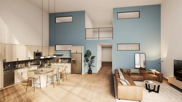 Kitchen island couch and television living room at Northpoint Crossing in College Station Student Accommodation