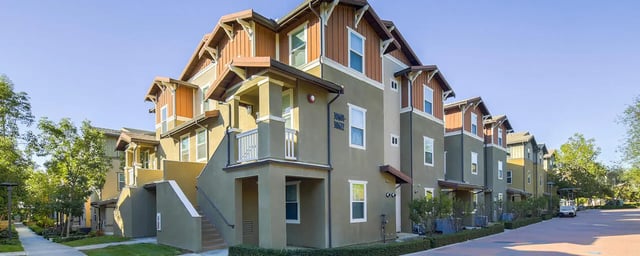 Apartment buildings with balconies and stairways exterior at Camino del Sol in Irvine Student Accommodation