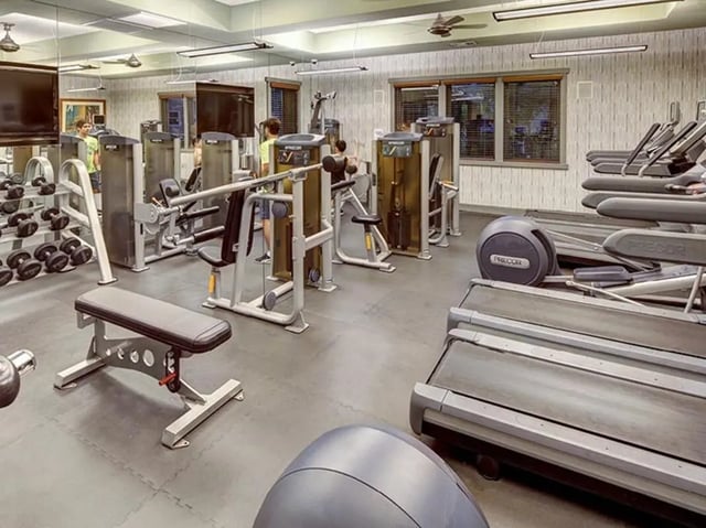 Gym equipment and treadmills fitness area at Camino del Sol in Irvine Student Accommodation