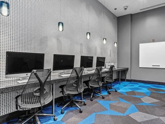 Computers chairs and whiteboard study area at Chestnut Square in Philadelphia Student Accommodation