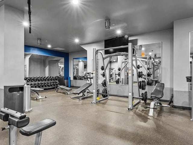 Dumbbell rack weight machine benches and mirrors gym at Chestnut Square in Philadelphia Student Accommodation