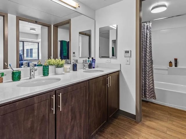 Double vanity bathroom with shower bath and toiletries Bathroom at Chestnut Square in Philadelphia Student Accommodation