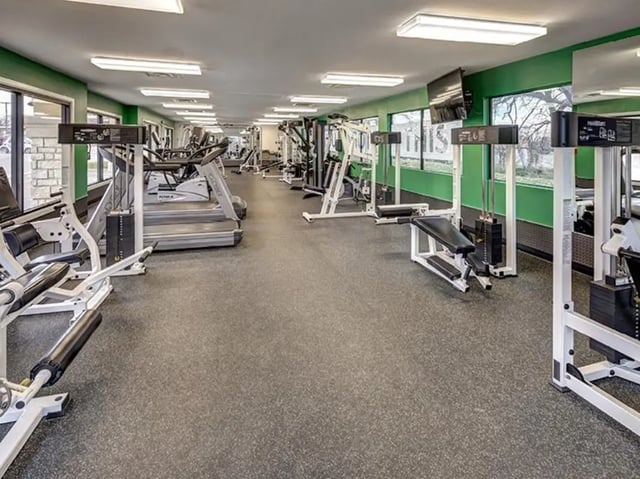 Weight machines treadmills and exercise equipment gym at City Parc at Fry Street in Denton Student Accommodation