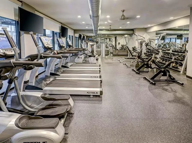 Treadmills ellipticals weights and machines gym at Crest at Pearl in Austin Student Accommodation