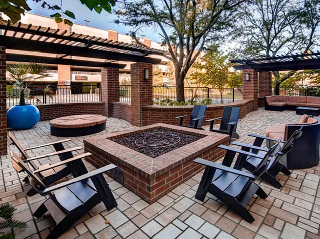Outdoor seating fire pit lounge area exterior at 601 Copeland in Tallahassee Student Accommodation