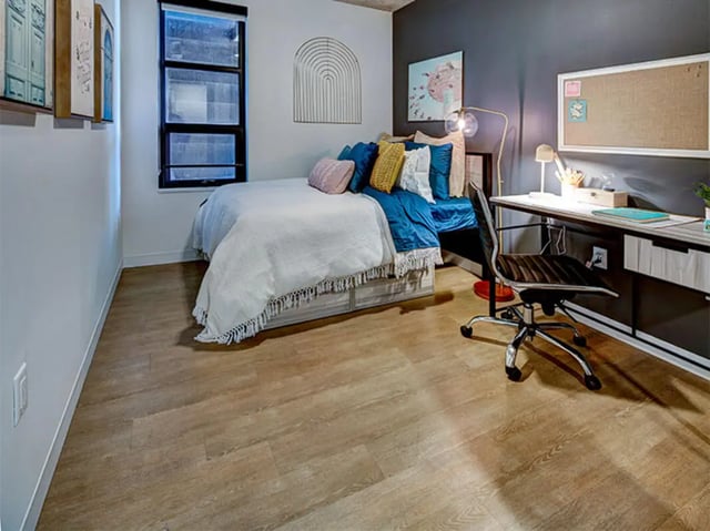 Bed desk chair and artwork Bedroom at Campus Edge Ann Arbor in Ann Arbor Student Accommodation
