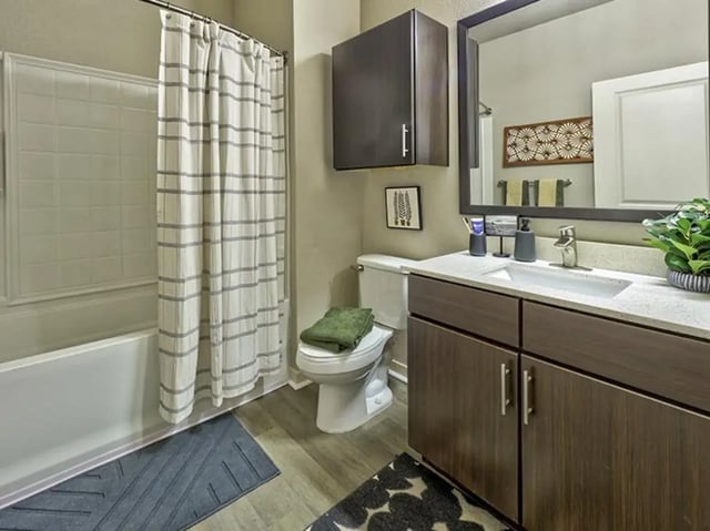 Bathtub toilet vanity with sink bathroom interior at 160 Ross in Auburn Student Accommodation