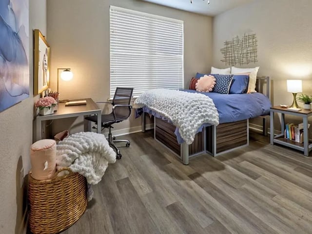 Desk chair bed basket and bedside table bedroom at 160 Ross in Auburn Student Accommodation