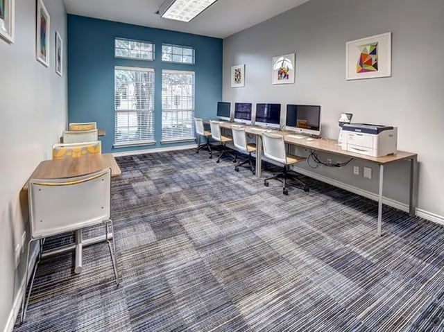 Computers printers desks and chairs study area at Bishops Square in San Marcos Student Accommodation