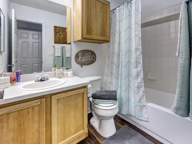 Sink toilet shower with towels bathroom at Bishops Square in San Marcos Student Accommodation