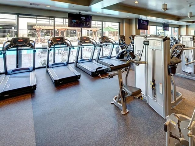 Treadmills weight machines gym area fitness room at Campus Edge on UTA Boulevard in Arlington Student Accommodation