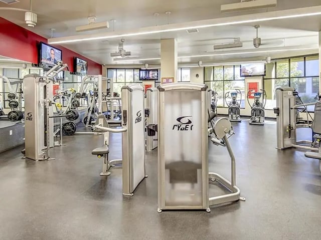Gym with weight machines and exercise equipment gym at Casas del Rio in Albuquerque Student Accommodation