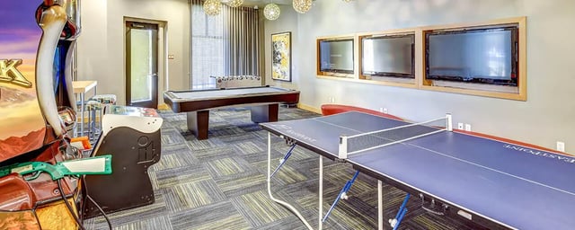 Gaming arcade pool table ping pong tables common area at Casas del Rio in Albuquerque Student Accommodation
