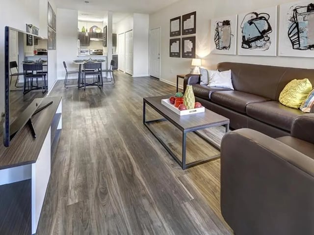 Leather couch coffee table with tray living room at Campus Edge on UTSA Boulevard in San Antonio Student Accommodation