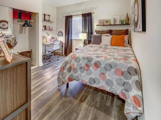 Bed desk closet and globe bedroom at Campus Edge on UTSA Boulevard in San Antonio Student Accommodation